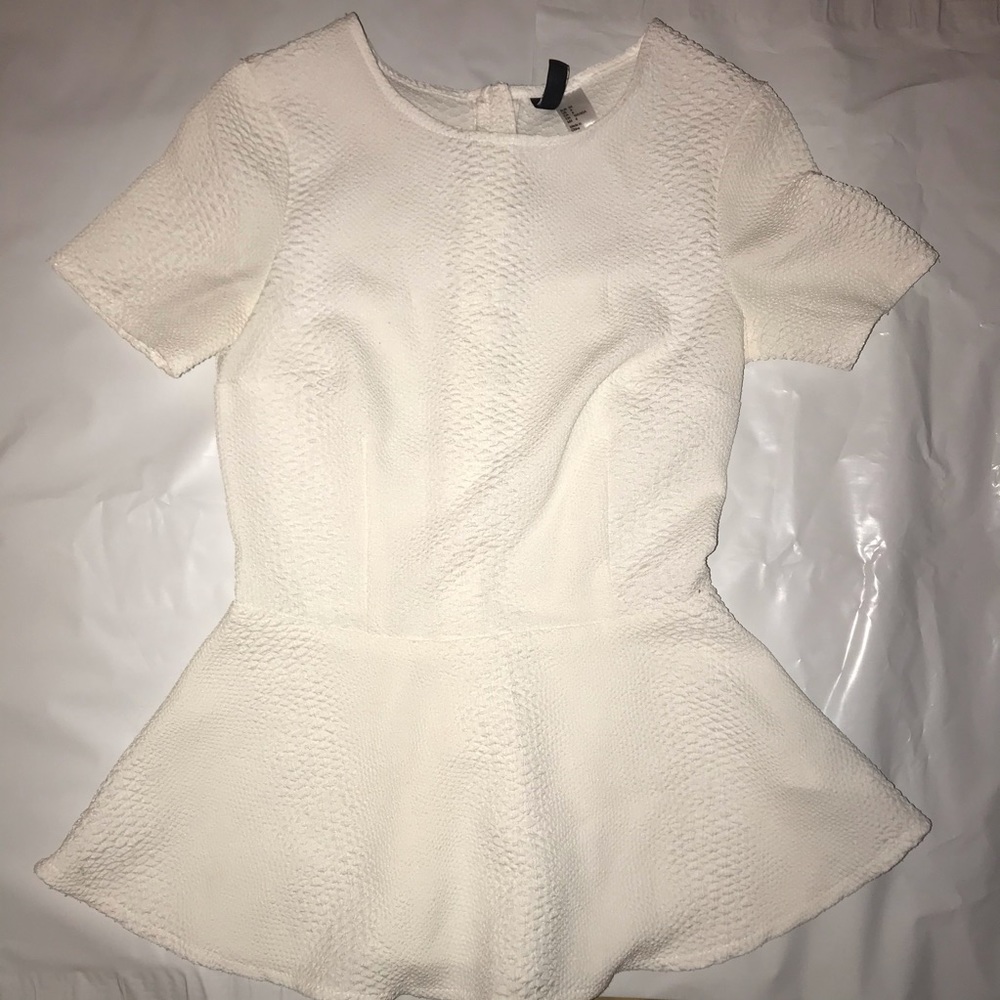 Size 4 snake peplum top